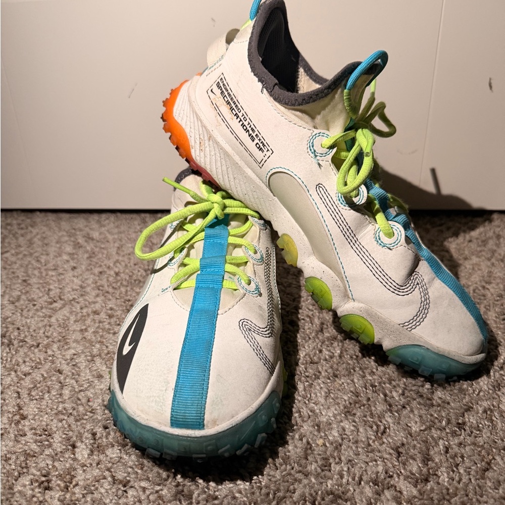 Nike Kids White Sneakers with Blue and Green Accents
